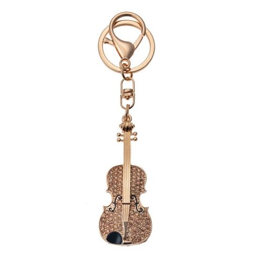 Fém kulcstartó hegedűvel, arany színű üveggyönggyel